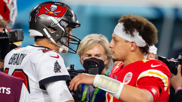 Feb 7, 2021; Tampa, FL, USA; Tampa Bay Buccaneers quarterback Tom Brady (left) greets Kansas City Chiefs quarterback Patrick Mahomes following Super Bowl LV at Raymond James Stadium. Mandatory Credit: Mark J. Rebilas-USA TODAY Sports
